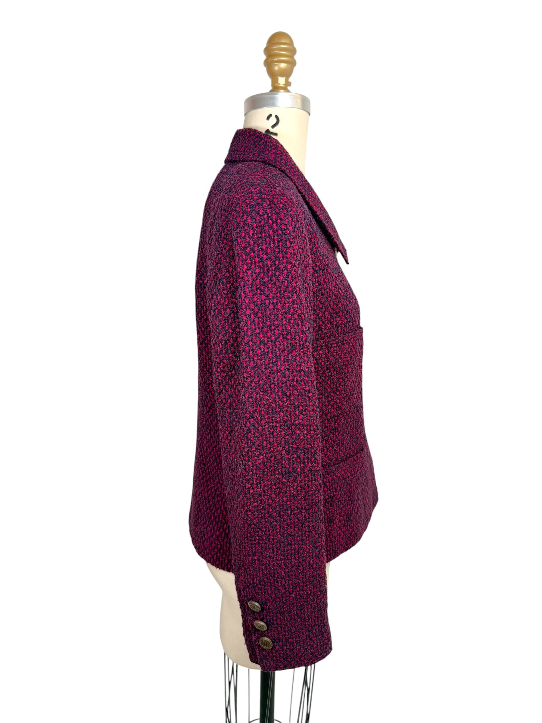 Side profile view of Chanel 1998 tweed jacket showing tailored silhouette and cuff CC buttons