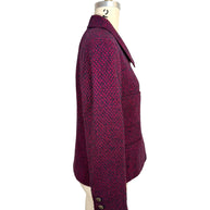 Side profile view of Chanel 1998 tweed jacket showing tailored silhouette and cuff CC buttons