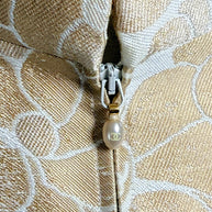 Chanel CC logo zipper pull detail on Spring 2001 runway vest