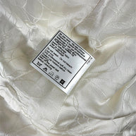 Chanel care label detail dry clean instructions silk lined vest