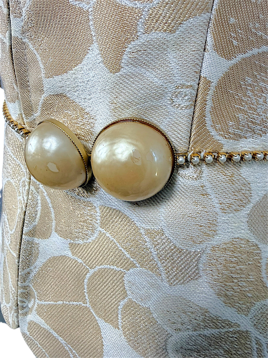 Chanel runway vest pearl belt close up showing light wear on oversized pearls