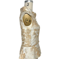Chanel runway vest side profile showing structured peplum waist and tailoring