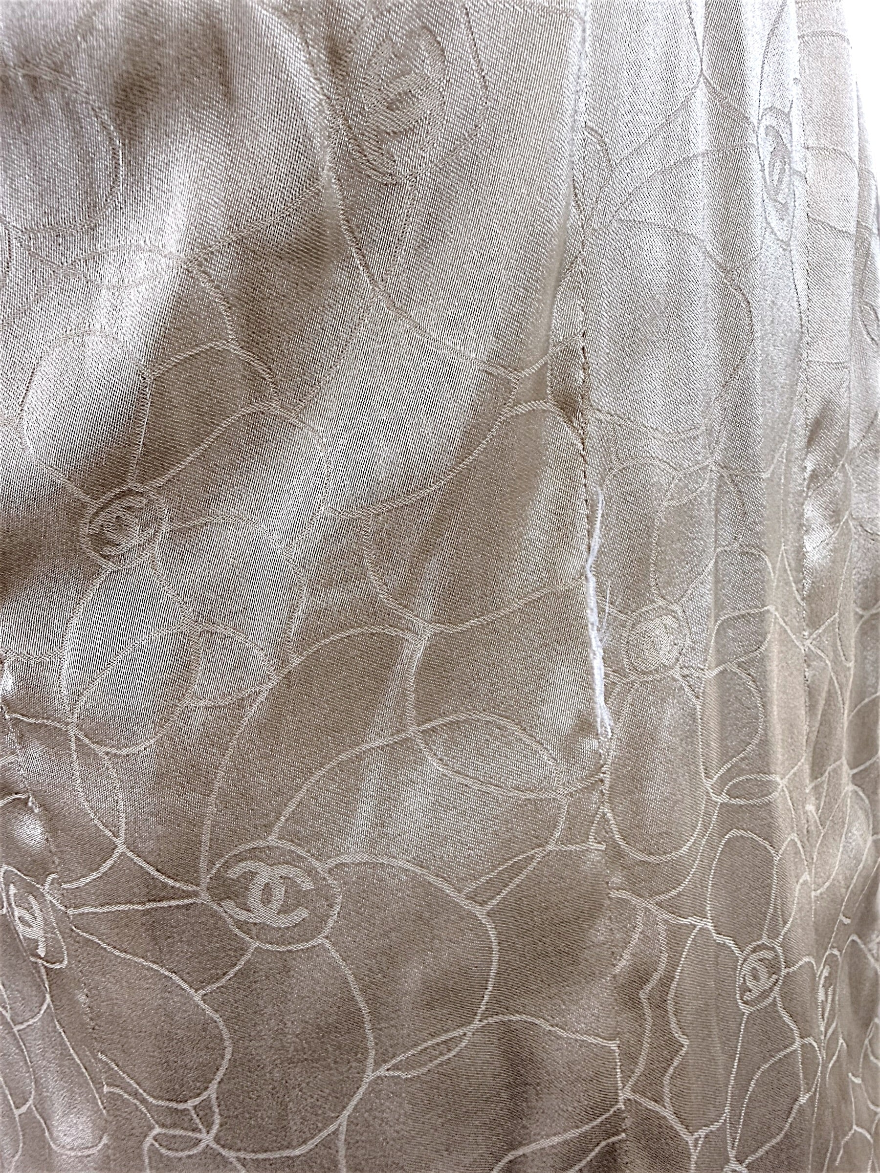 Close-up detail of Chanel silk camellia jacquard lining inside authentic 2004 Lesage tweed jacket