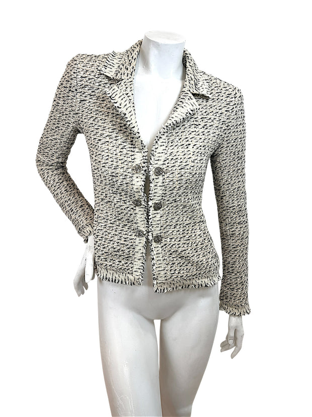 Authentic Chanel 2004 Lesage tweed fringe jacket in ivory cream and black with fitted silhouette and logo buttons front view