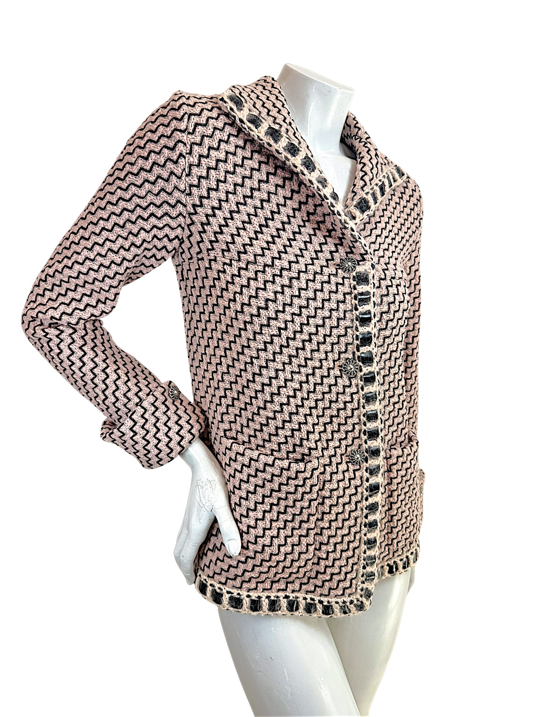 Angled front view Chanel Pre-Fall 2016 runway jacket Look 36 pink black textured tweed with boucle trim