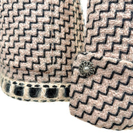 Chanel Pre-Fall 2016 jacket sleeve detail with signature button and boucle trim cuff