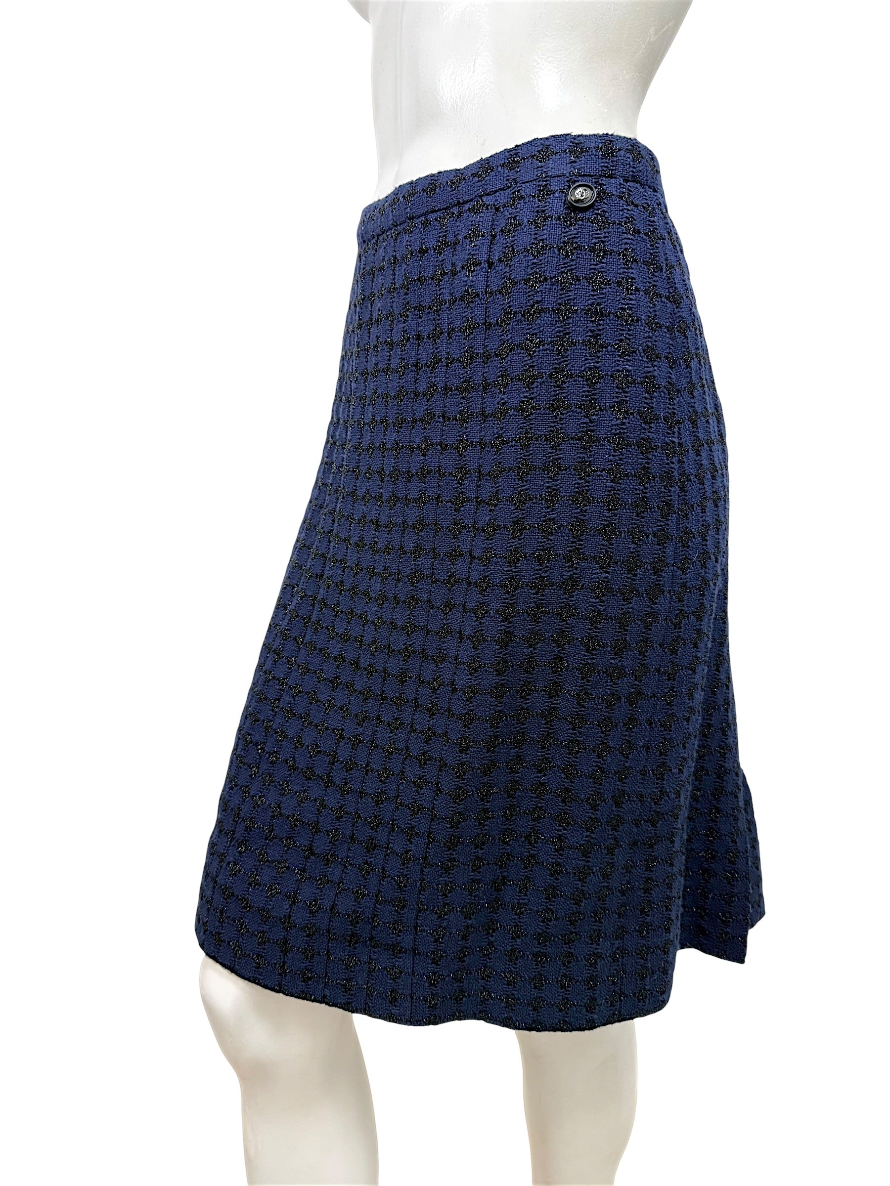 Chanel blue tweed skirt side view showing structure and drape