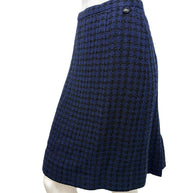 Chanel blue tweed skirt side view showing structure and drape