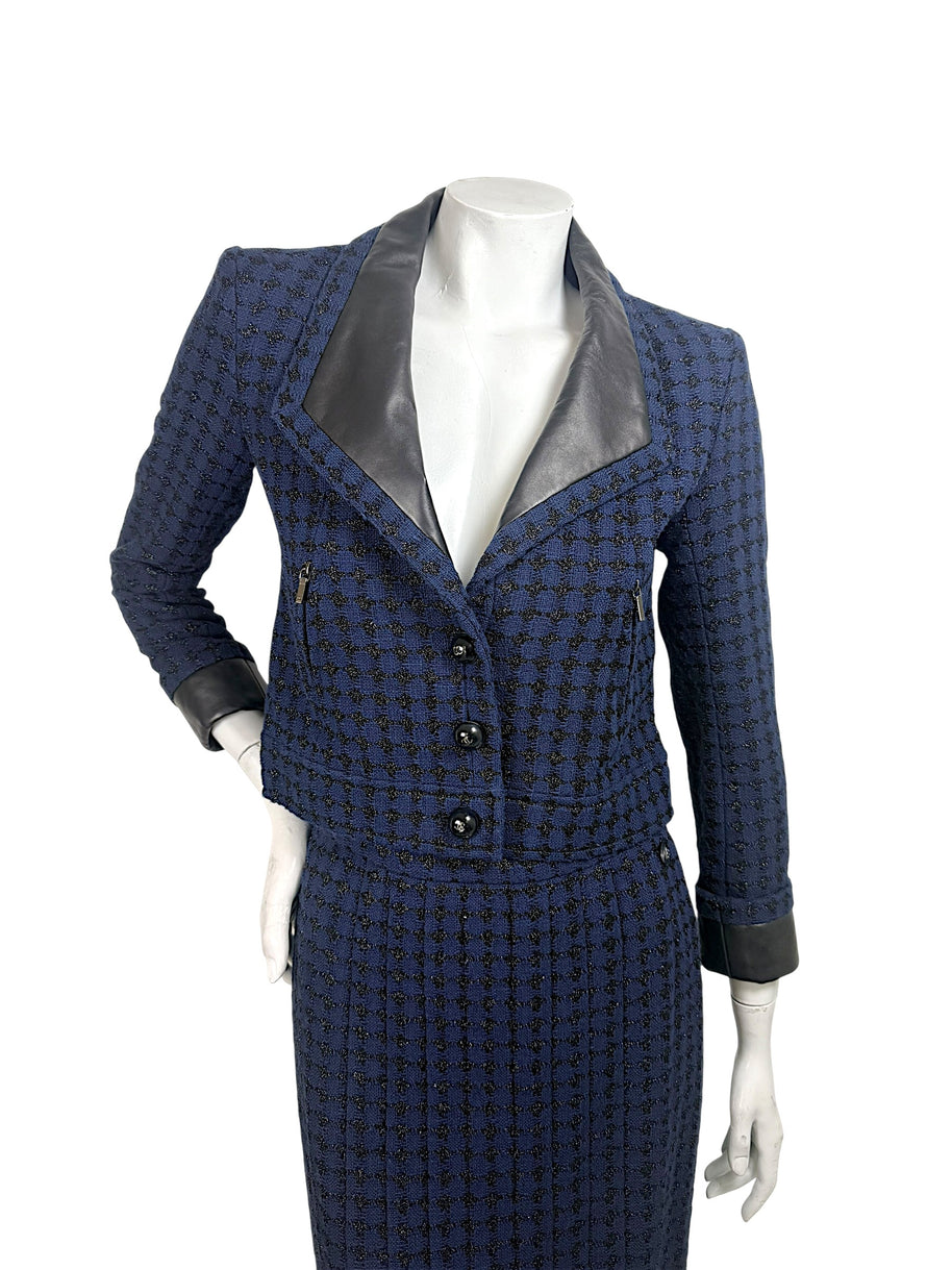 Chanel 2016P tweed jacket front view with black lambskin leather lapels and CC buttons
