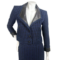 Chanel 2016P tweed jacket front view with black lambskin leather lapels and CC buttons