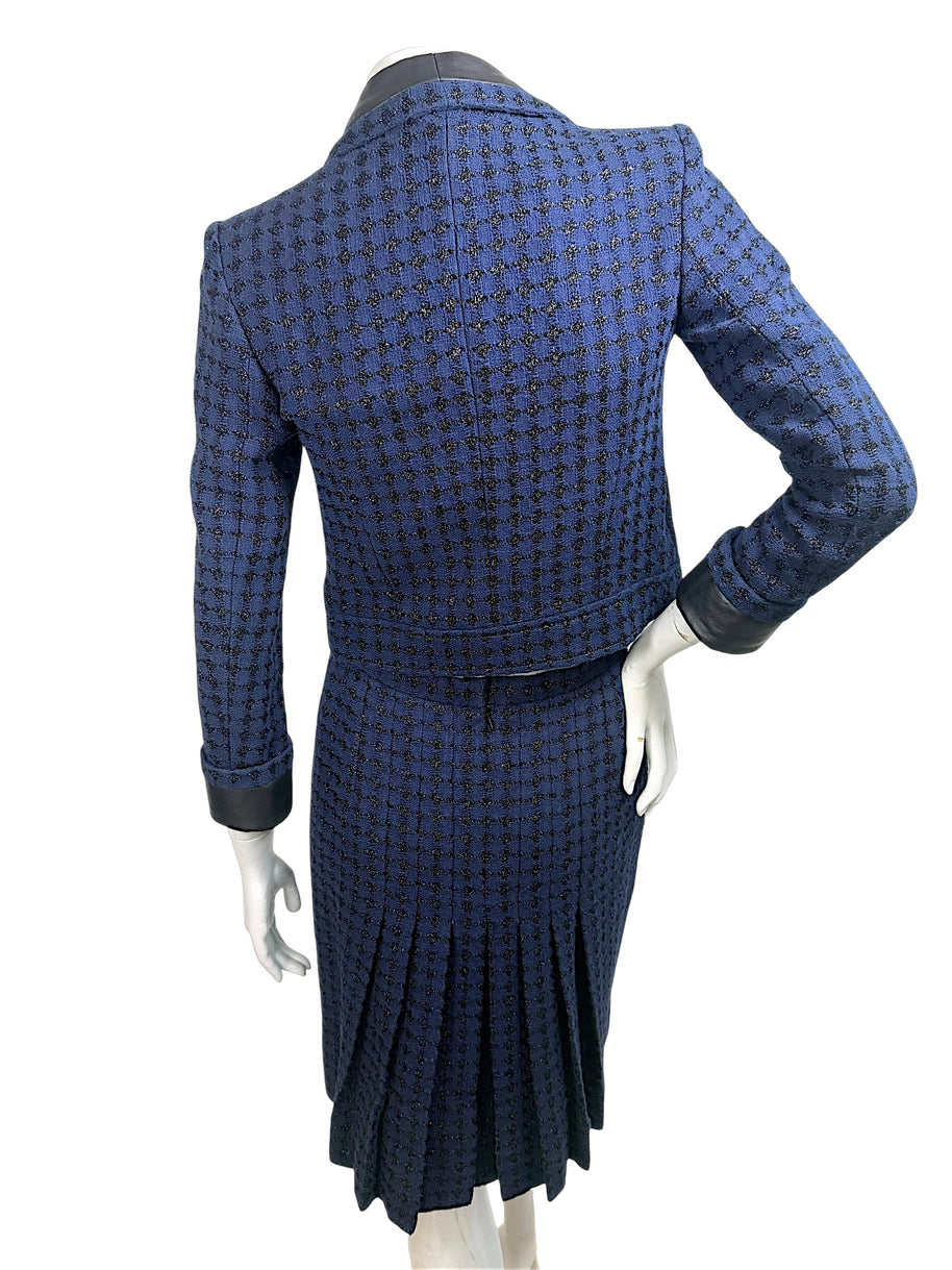 Chanel Spring 2016 tweed skirt suit back view with pleated skirt detail