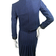Chanel Spring 2016 tweed skirt suit back view with pleated skirt detail