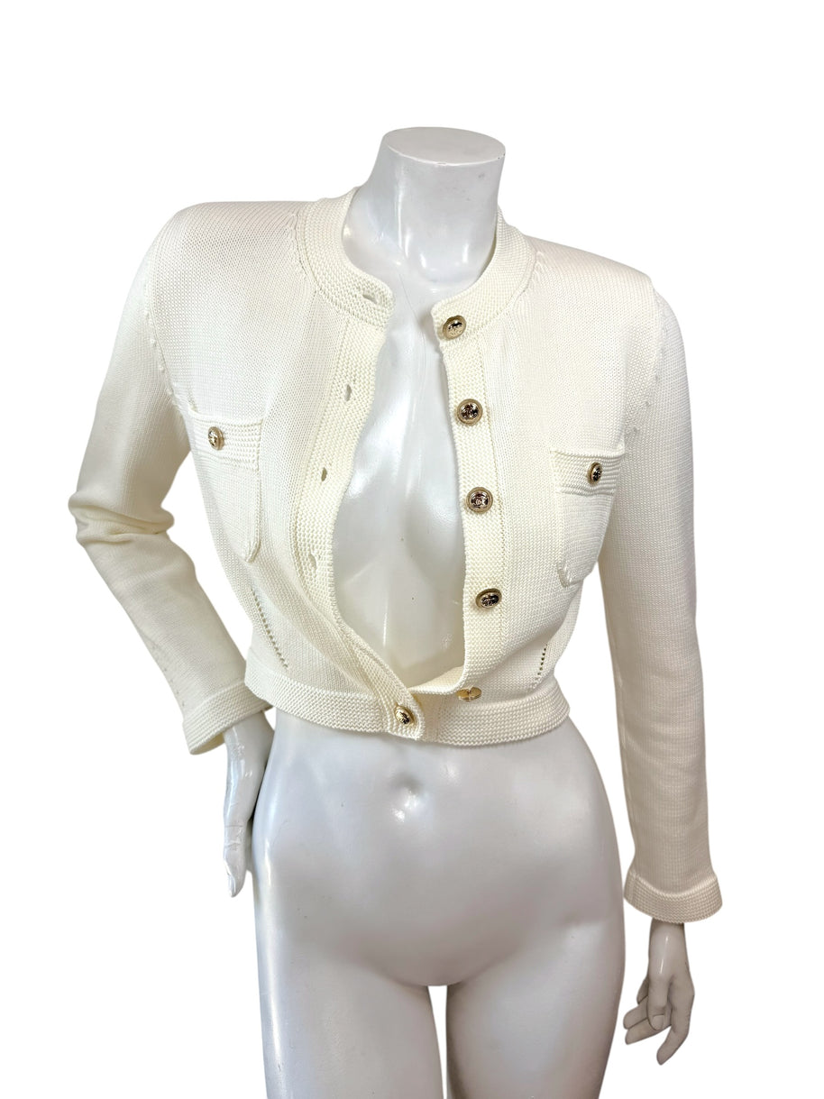 Chanel 2019 ivory cropped knit cardigan jacket with gold logo buttons front view