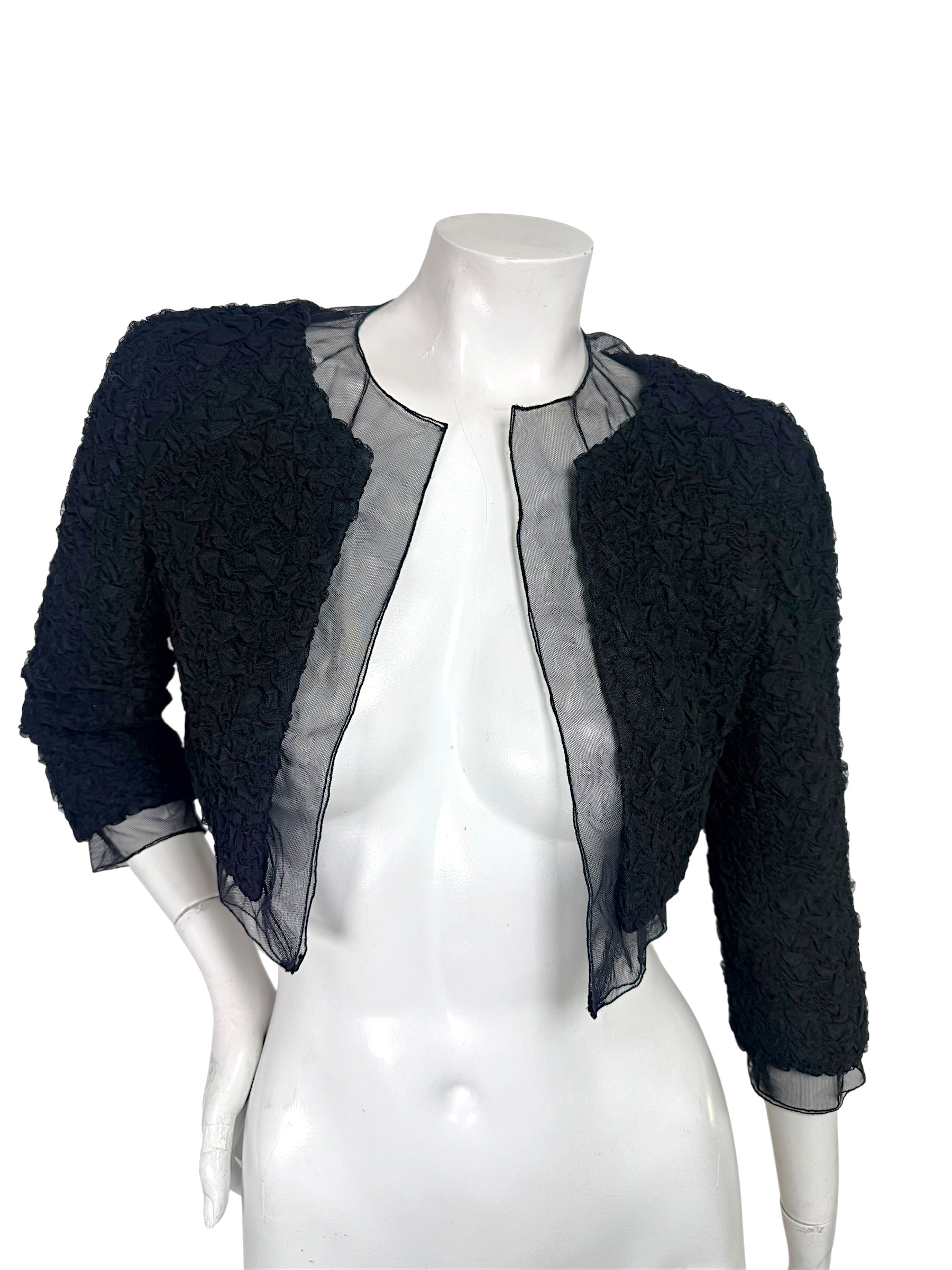 Chanel black ruched cropped bolero jacket with sheer silk chiffon neckline and open front, front view
