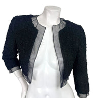 Chanel black ruched cropped bolero jacket with sheer silk chiffon neckline and open front, front view