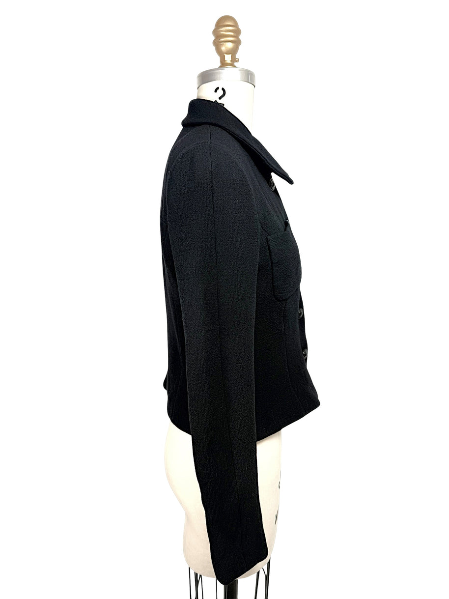 Right side profile of Chanel Boutique black cropped tailored jacket