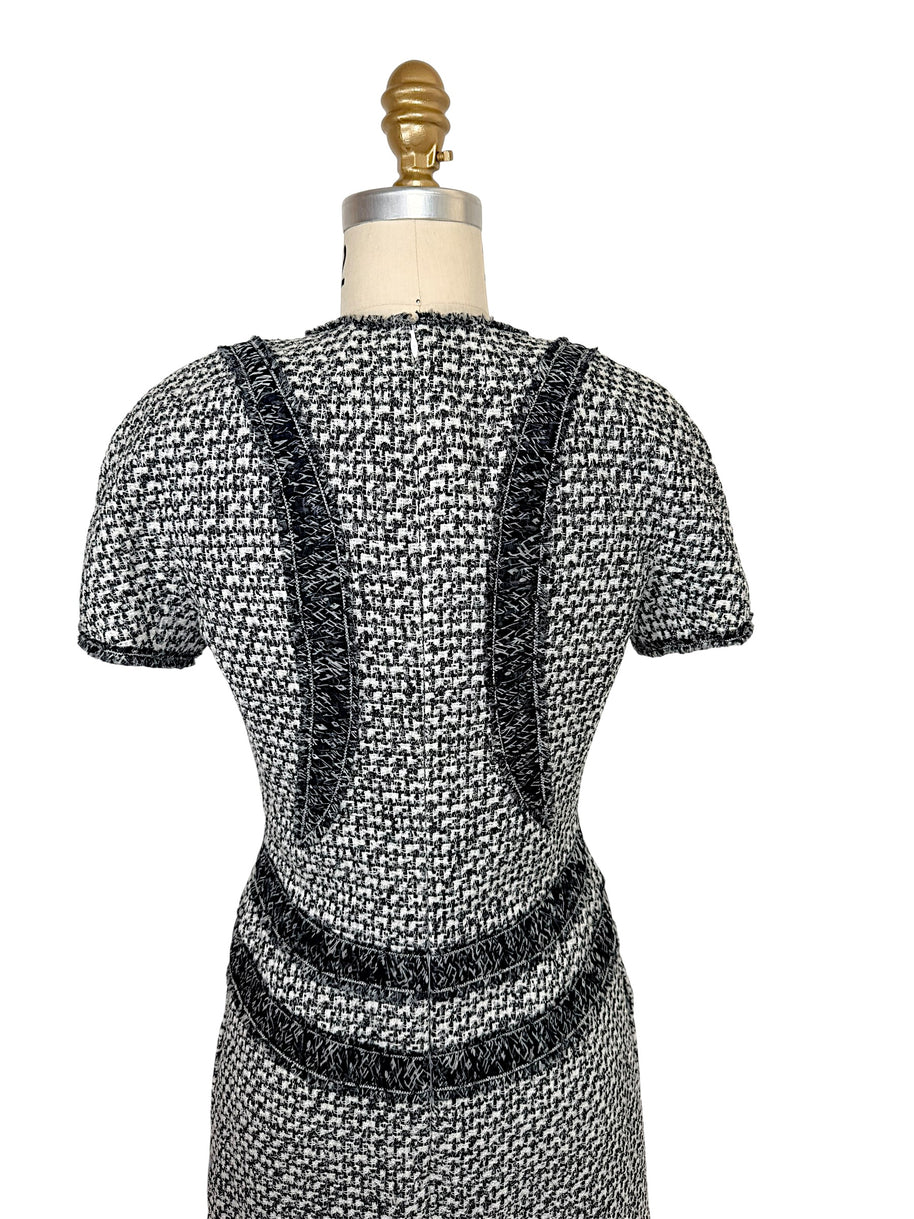 Rear detail of Chanel tweed mini dress with ribbon trim accents