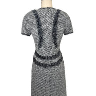 Full back view of Chanel black and white tweed mini dress