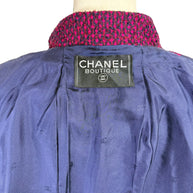 Close-up of Chanel Boutique interior label on navy silk monogram lining