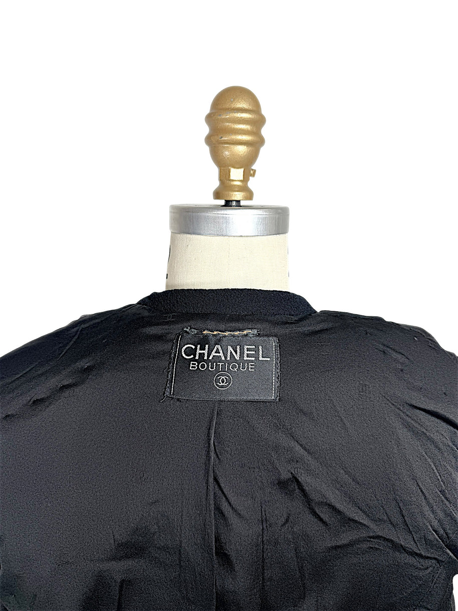 Close-up of Chanel Boutique made in France interior label on vintage black jacket