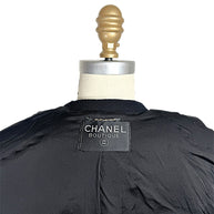 Close-up of Chanel Boutique made in France interior label on vintage black jacket