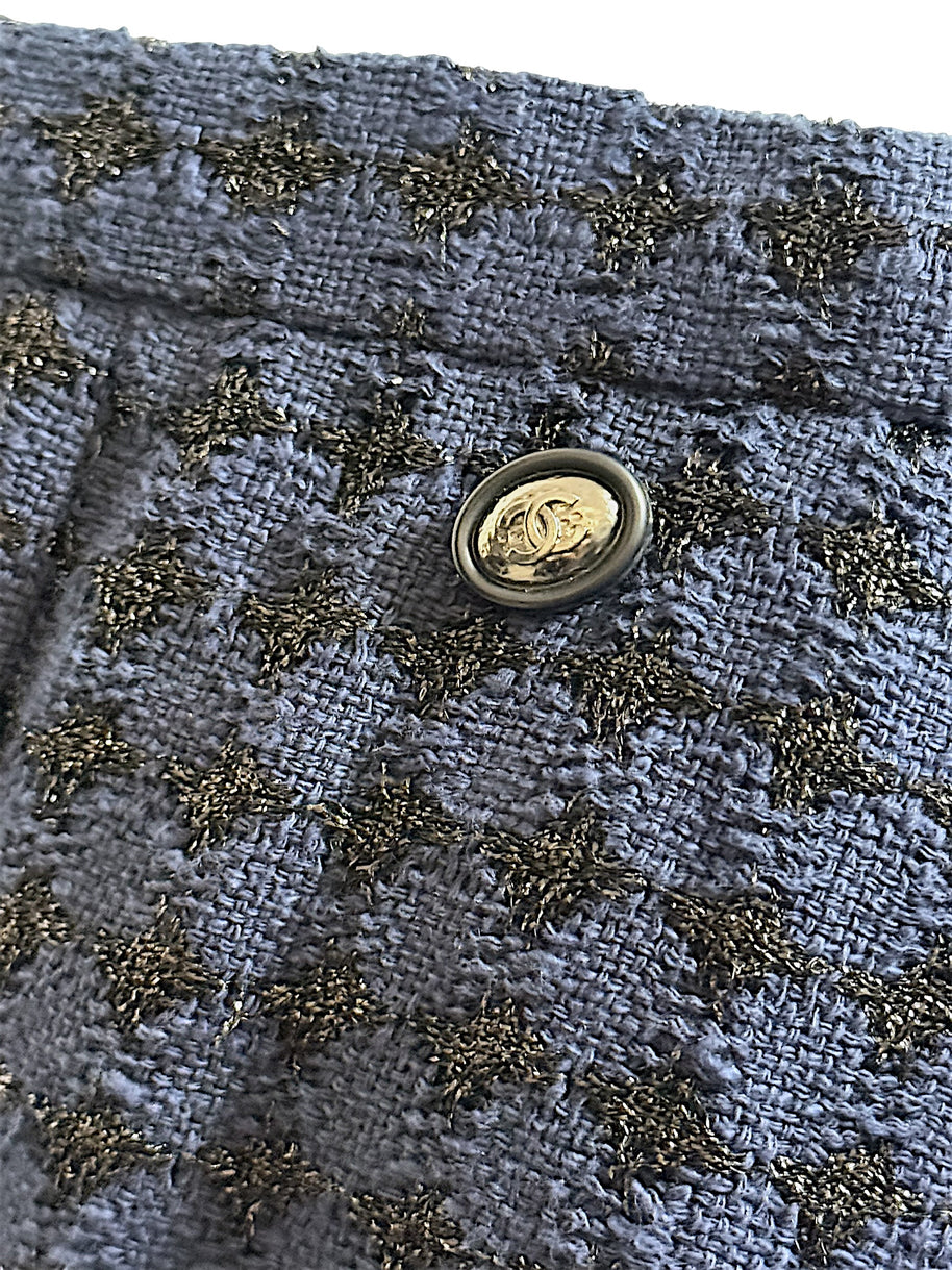 Chanel CC logo waist button detail on tweed skirt Spring 2016