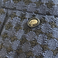 Chanel CC logo waist button detail on tweed skirt Spring 2016