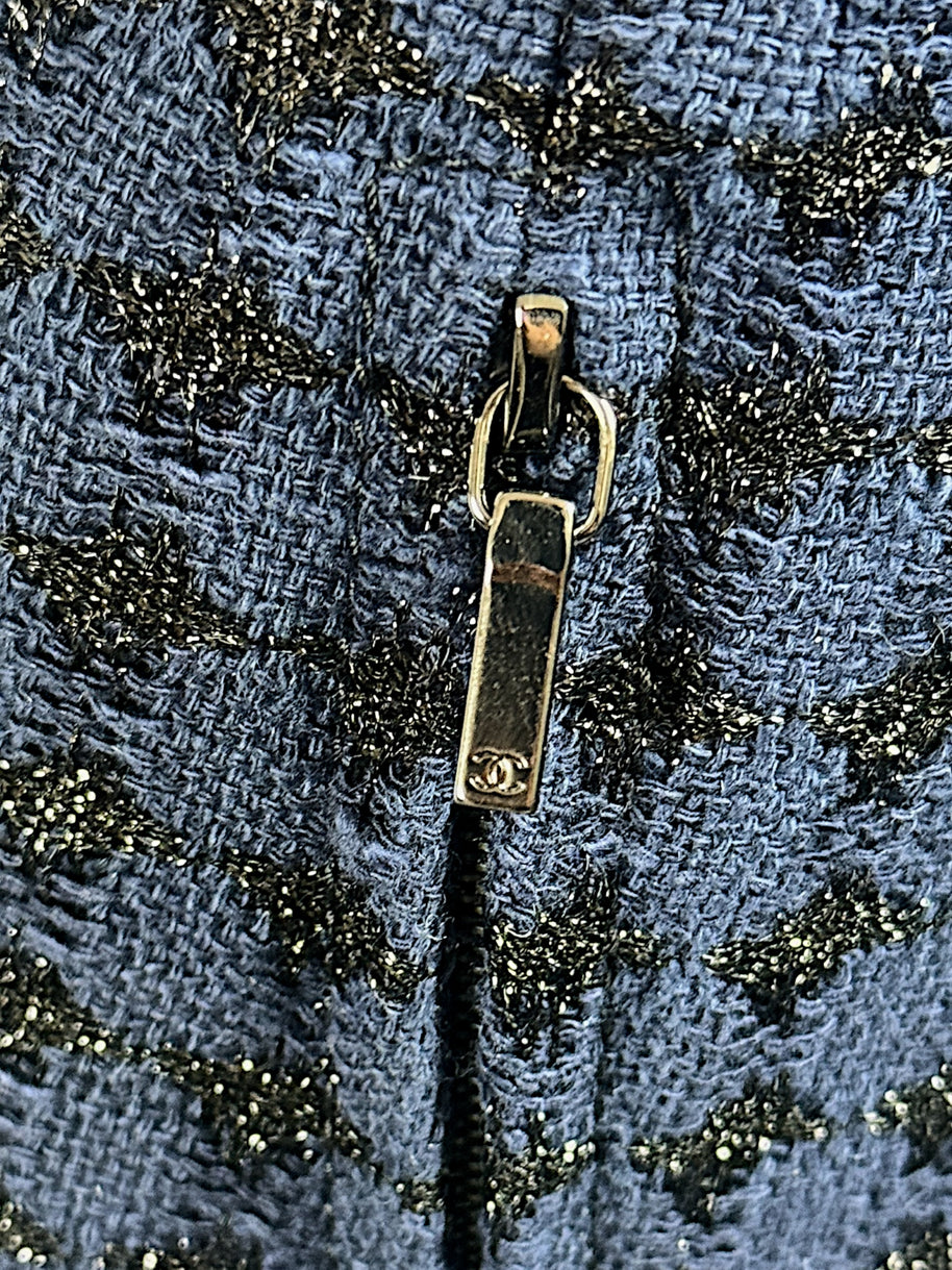 Chanel CC logo zipper pull detail on tweed jacket Spring 2016