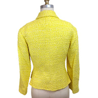 Back view of Chanel Cruise 2012 yellow bouclé tweed runway jacket with fitted silhouette and structured tailoring