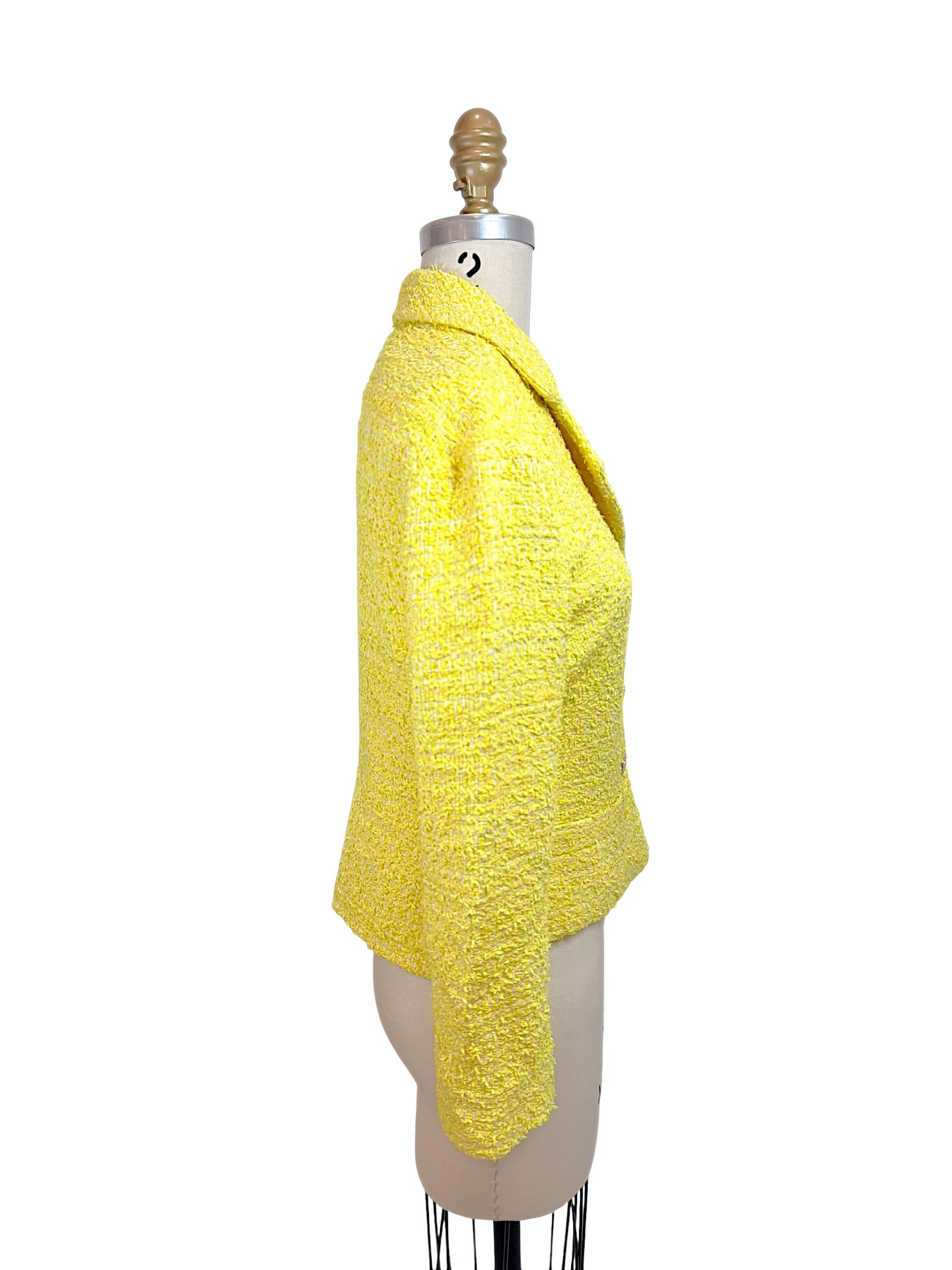 Right side profile of Chanel Cruise 2012 runway yellow bouclé tweed jacket designed by Karl Lagerfeld