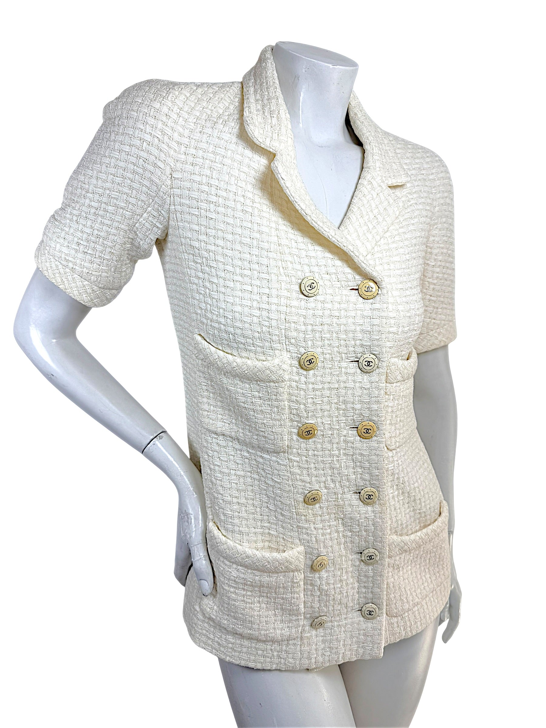 Angled front view of Chanel Cruise 2014 ivory textured tweed short sleeve jacket