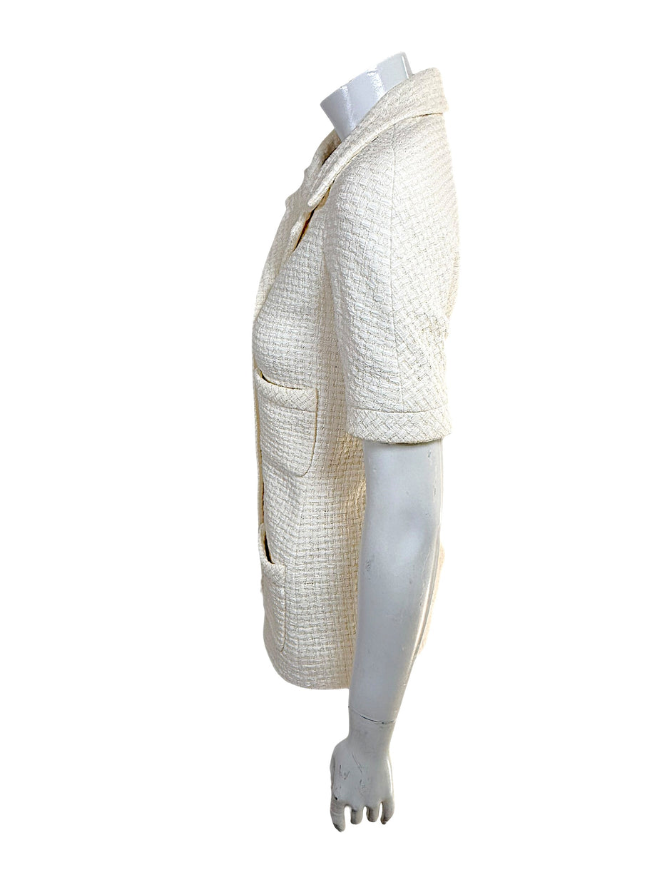 Right side profile of Chanel Cruise 2014 ivory Chanel tweed jacket