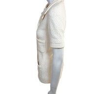 Right side profile of Chanel Cruise 2014 ivory Chanel tweed jacket