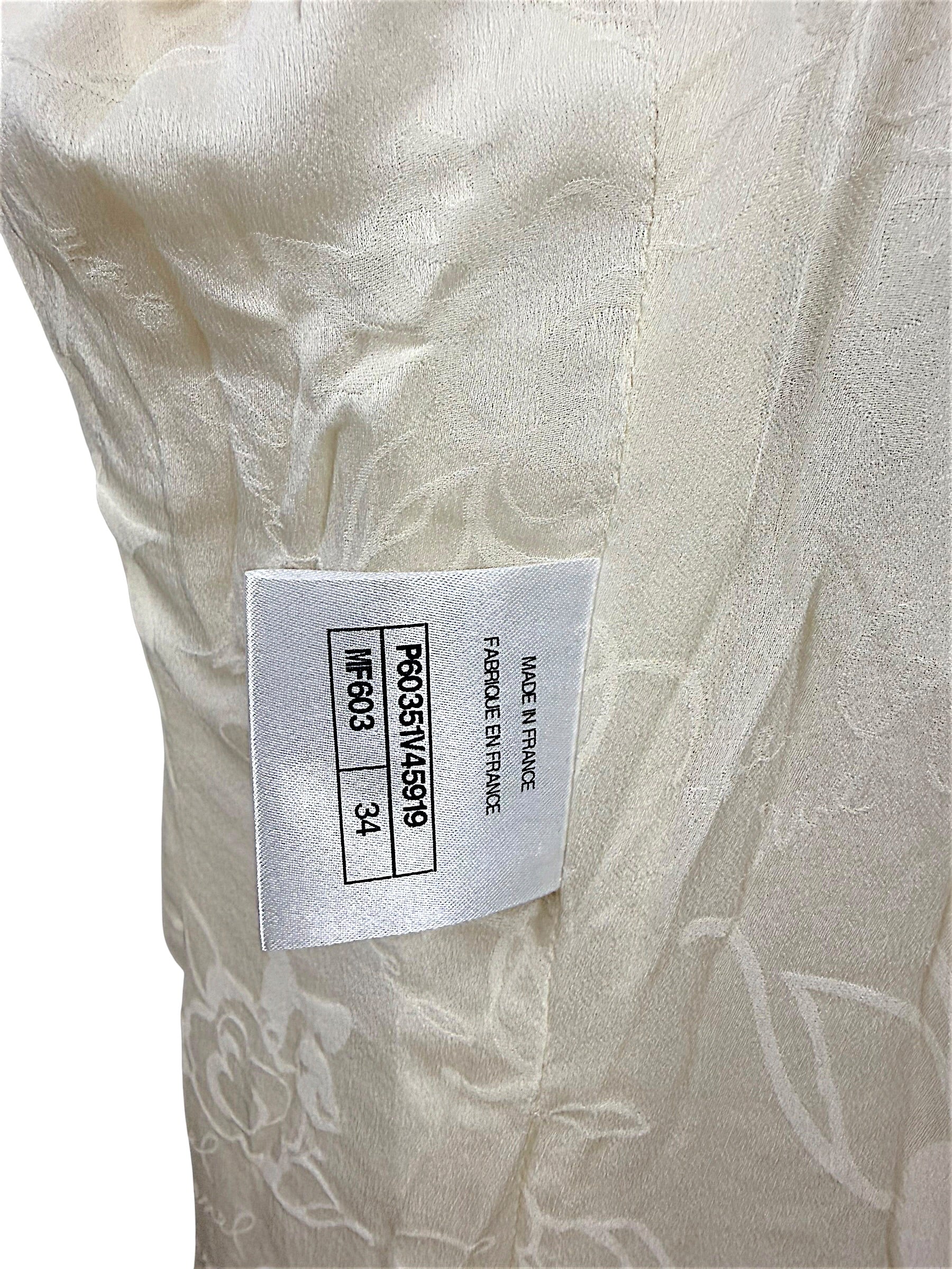 Interior production tag confirming authentic Chanel manufacture in France with style identification and French size 34.