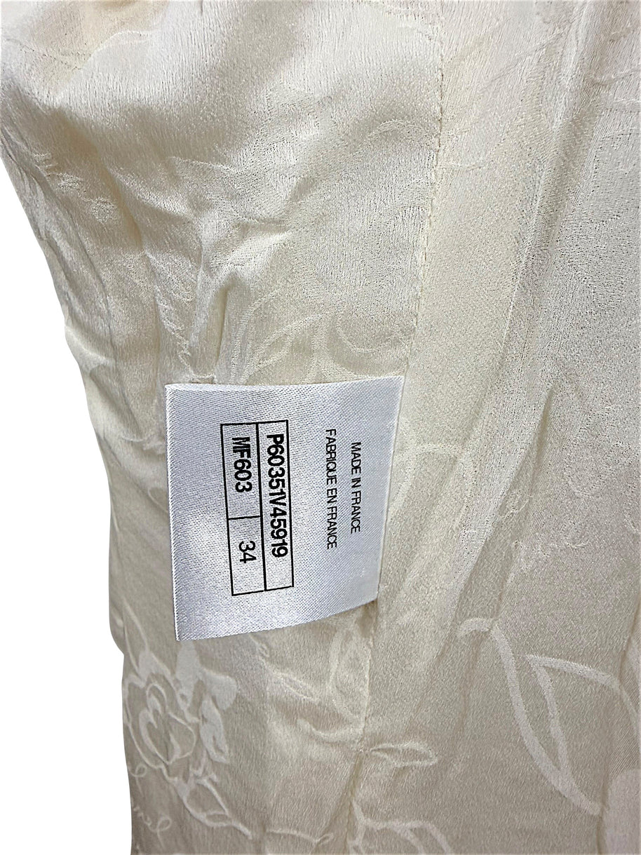 Interior production tag confirming authentic Chanel manufacture in France with style identification and French size 34.