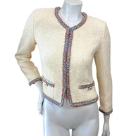 Chanel Cruise 2020 Look 74 ivory tweed jacket with multicolor trim front view