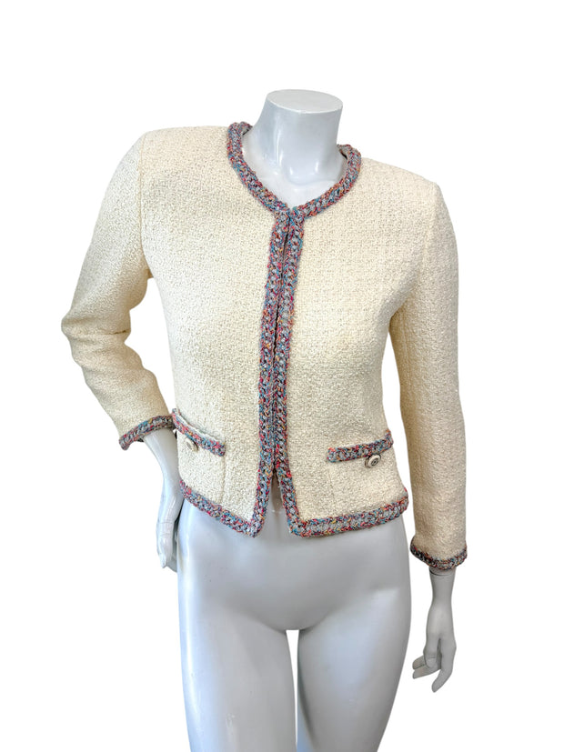 Chanel Cruise 2020 Look 74 ivory tweed jacket with multicolor trim front view