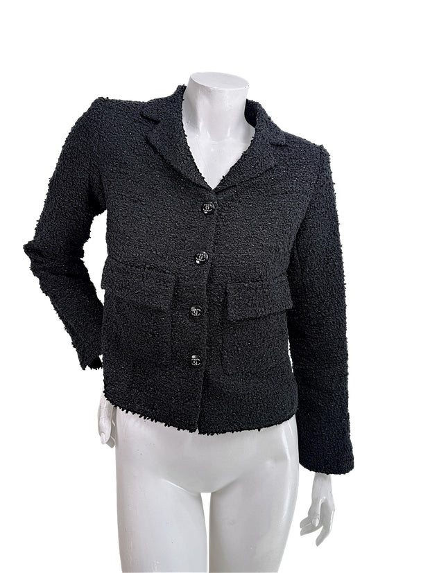 Chanel Cruise 2021 black bouclé tweed jacket front view with CC logo buttons documented from runway Look 13 alternate colorway size FR 34
