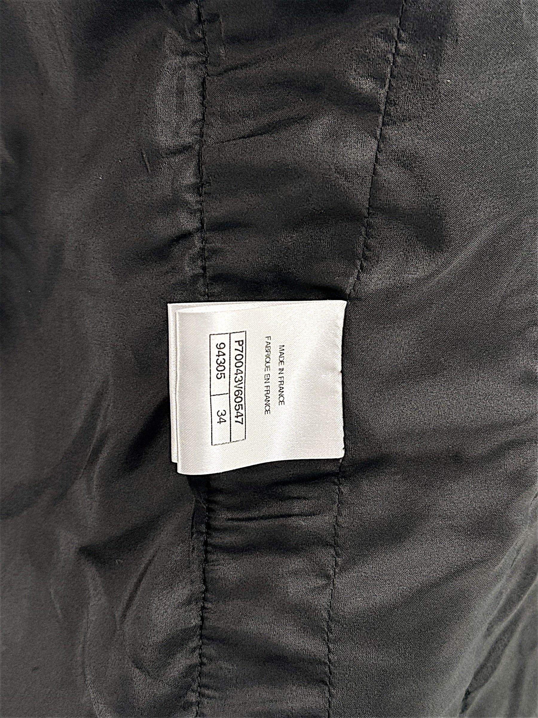 Interior production label of Chanel Cruise 2021 black tweed jacket made in France size FR 34