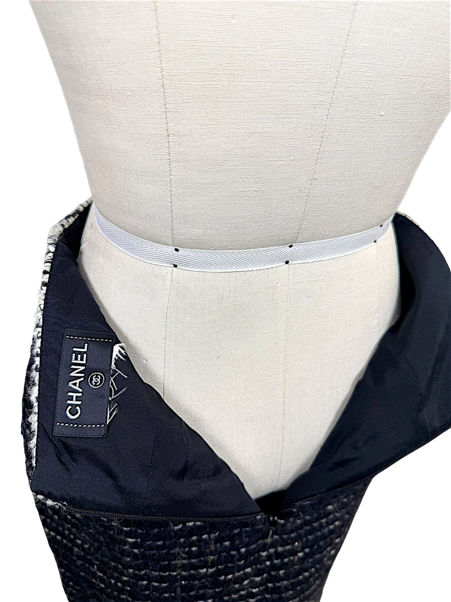 Interior view of Chanel Fall 2009 Runway Look 22 skirt showing lining, zipper closure, and Chanel label.
