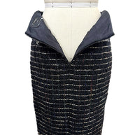 Interior view of the Chanel Fall 2009 Runway Look 22 skirt showing the Chanel label and black lining with concealed zipper closure.