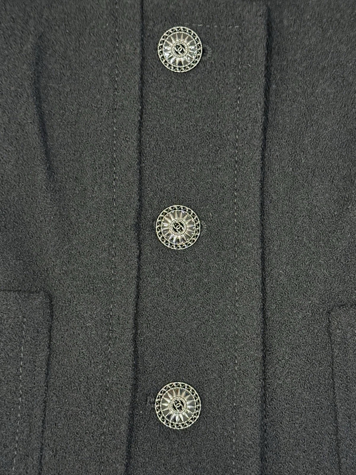 Chanel black wool silk jacket front button and fabric detail
