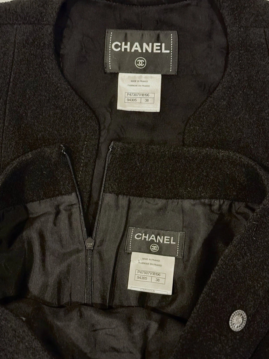 Chanel black jacket interior with Chanel label and garment tags