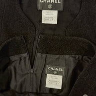 Chanel black jacket interior with Chanel label and garment tags