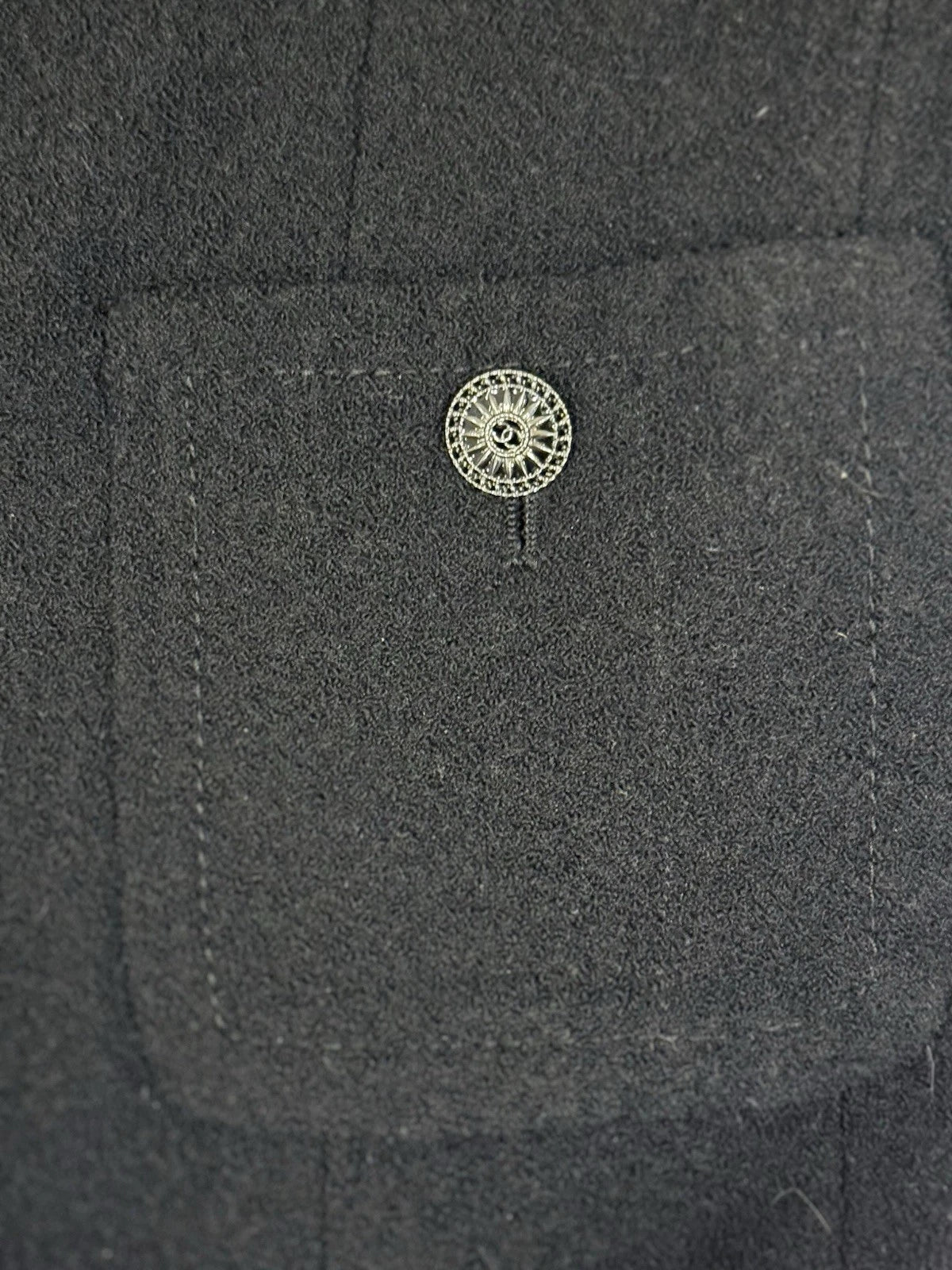 Chanel black wool silk jacket pocket and fabric detail