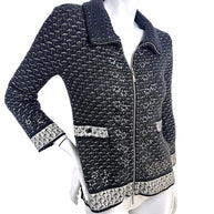 Angled front view of Chanel FW2010 mohair cashmere tweed blend appliqué jacket