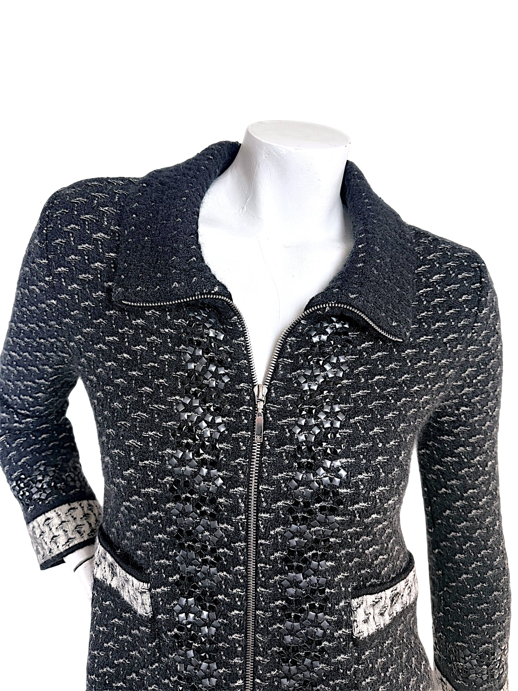 Close-up upper detail of Chanel FW2010 mohair cashmere tweed jacket with tonal appliqué trim