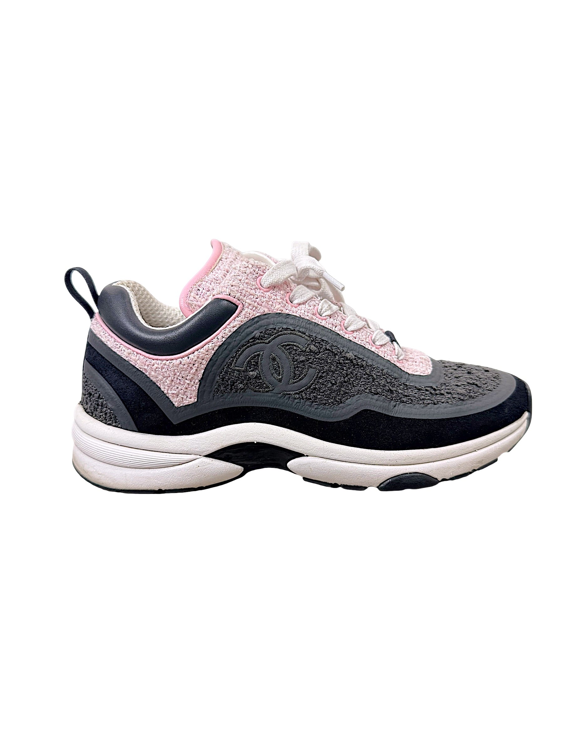 Side view of Chanel G34360 pink and grey tweed sneaker with tonal interlocking CC logo
