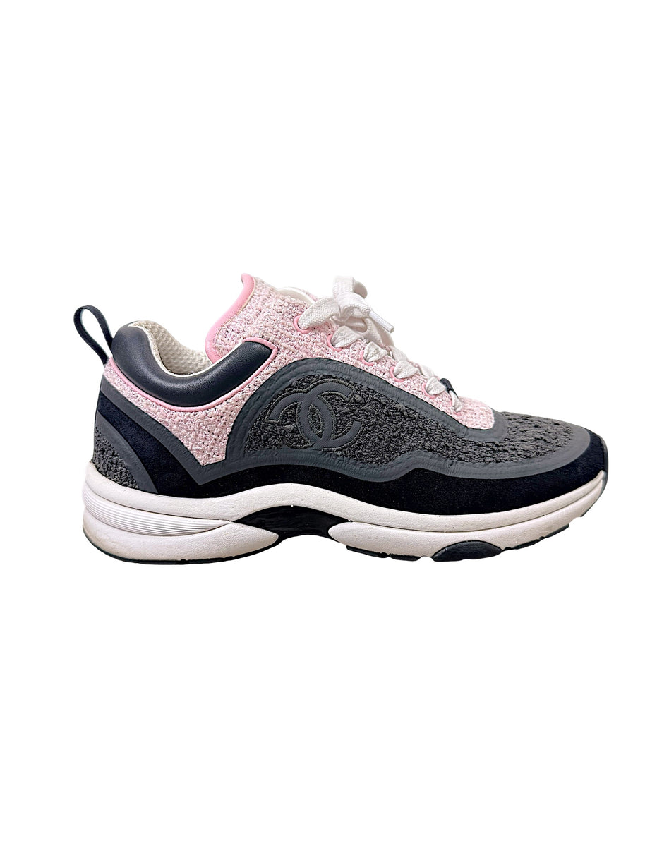 Side view of Chanel G34360 pink and grey tweed sneaker with tonal interlocking CC logo