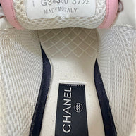 Chanel G34360 sneaker interior showing size 37.5 Made in Italy label and Chanel branded insole